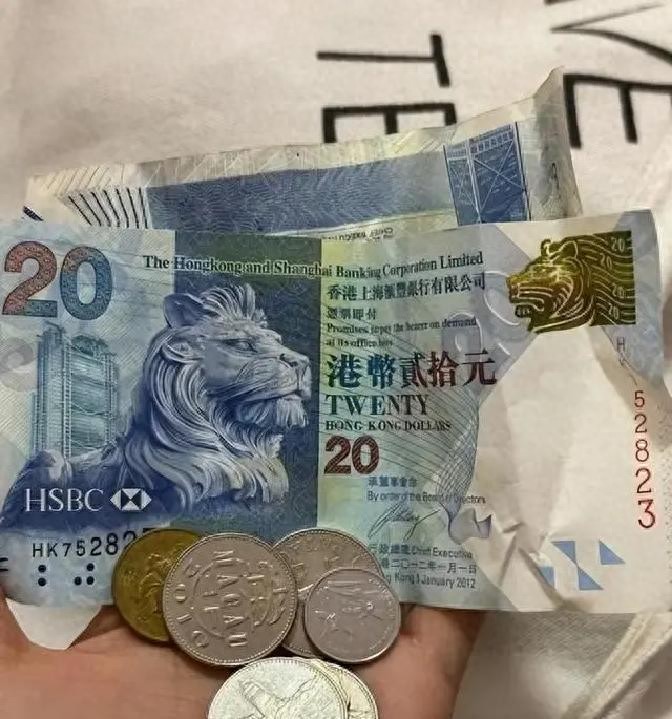 香港外汇市场港元汇率_港元兑美元汇率稳定机制_香港金管局联系汇率制度